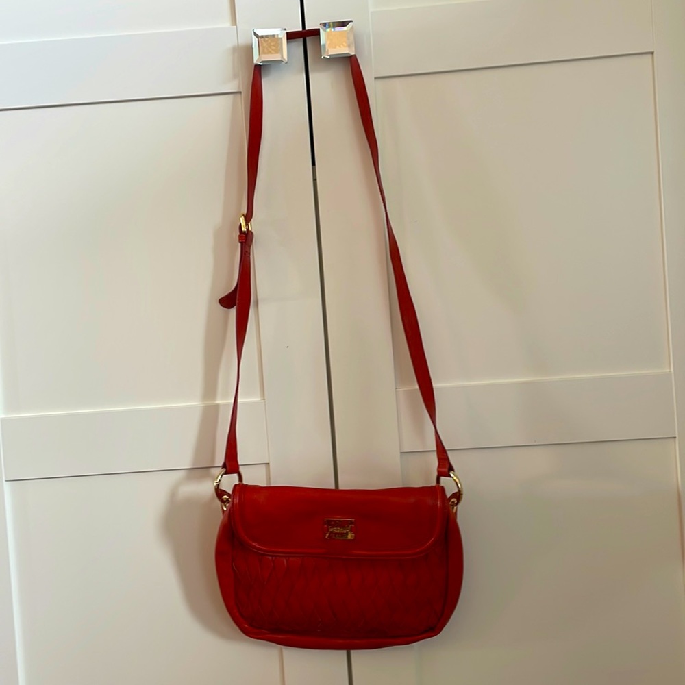 Orange leather Modalu London bag with long adjustable strap